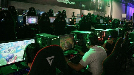People playing video games.
